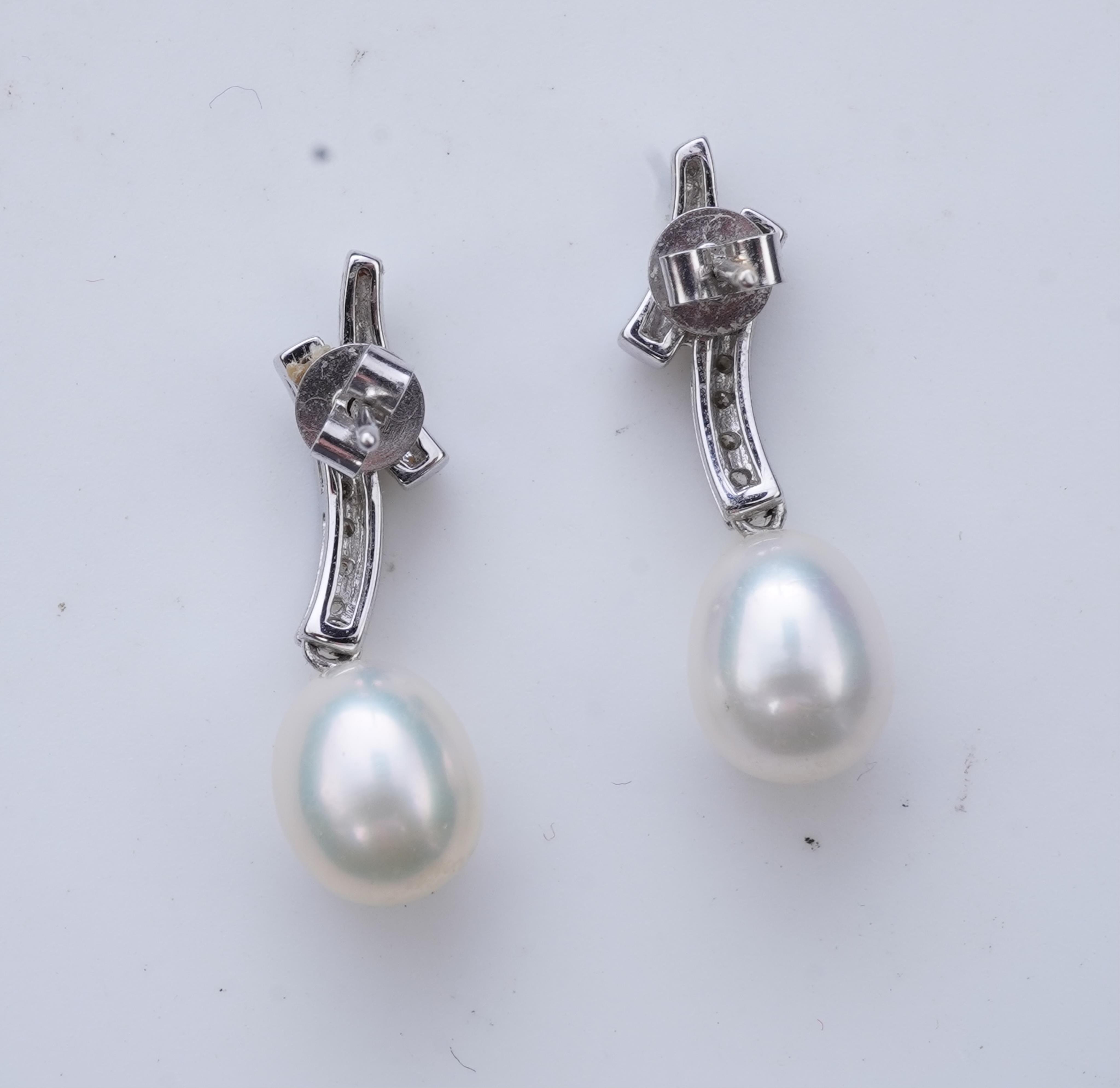 A cultured pearl and diamond demi-parure